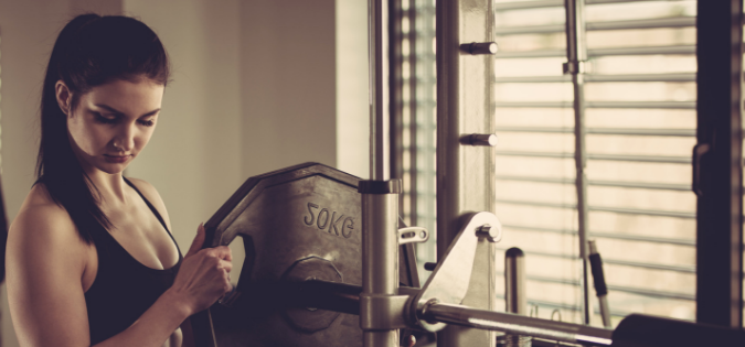 Weightlifting in gym | Fit to Last